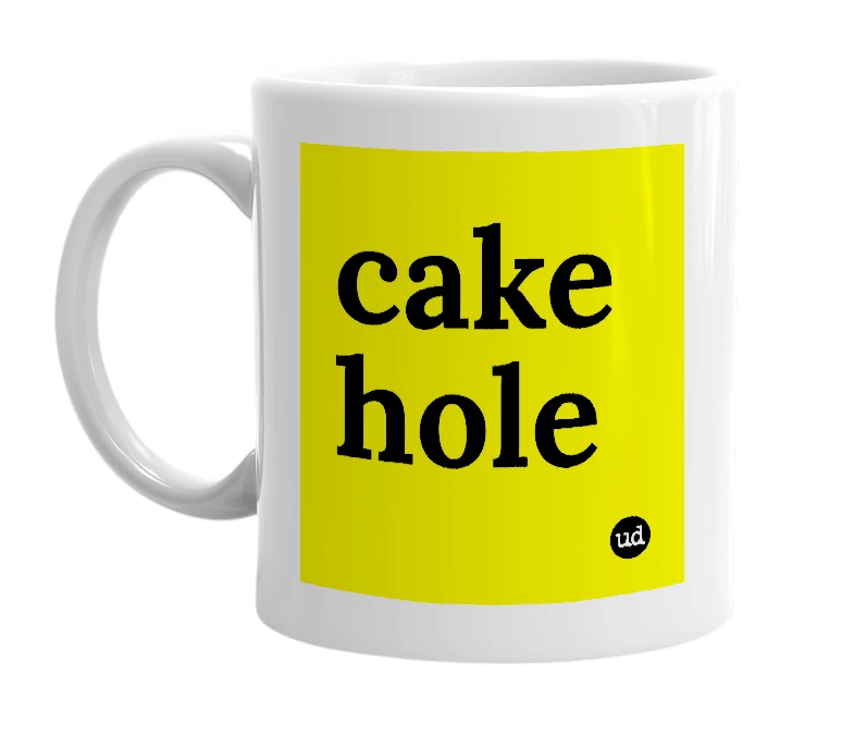 White mug with 'cake hole' in bold black letters