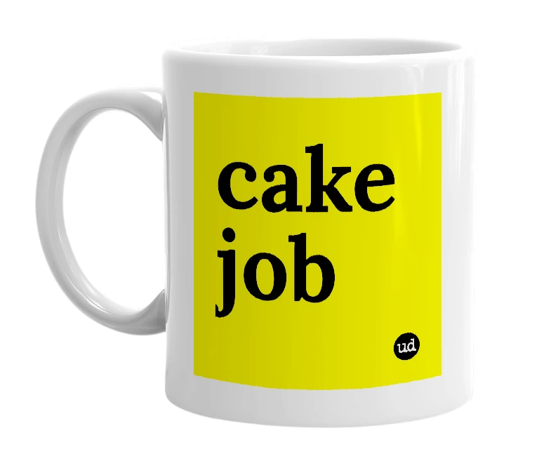 White mug with 'cake job' in bold black letters