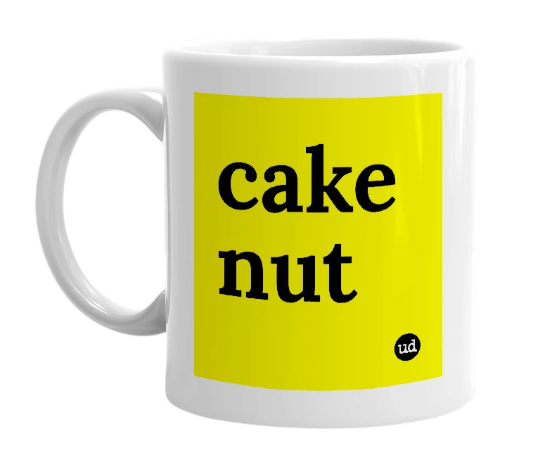 White mug with 'cake nut' in bold black letters