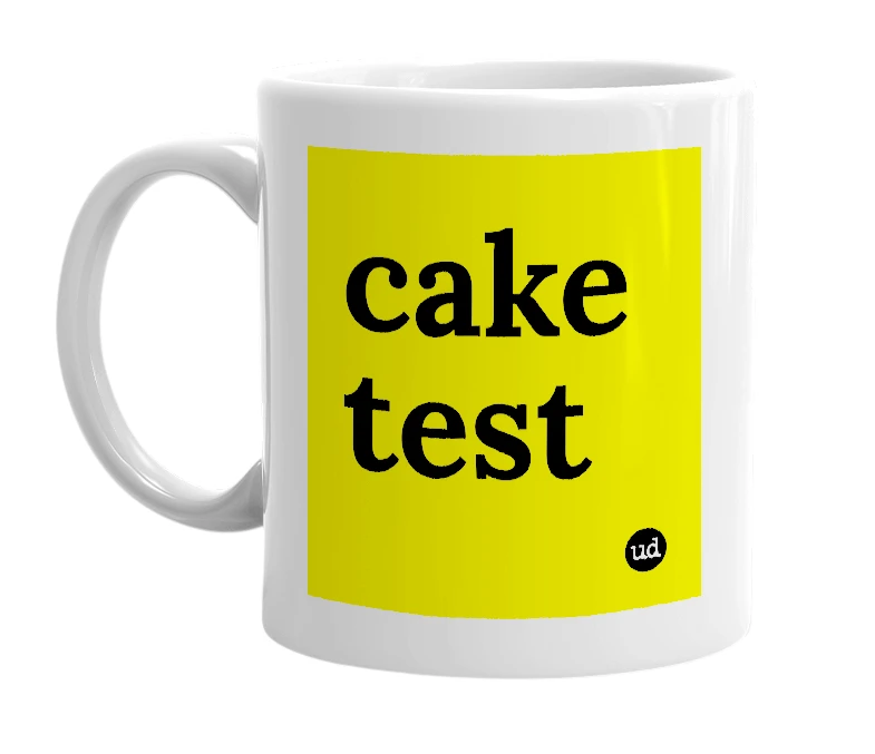 White mug with 'cake test' in bold black letters