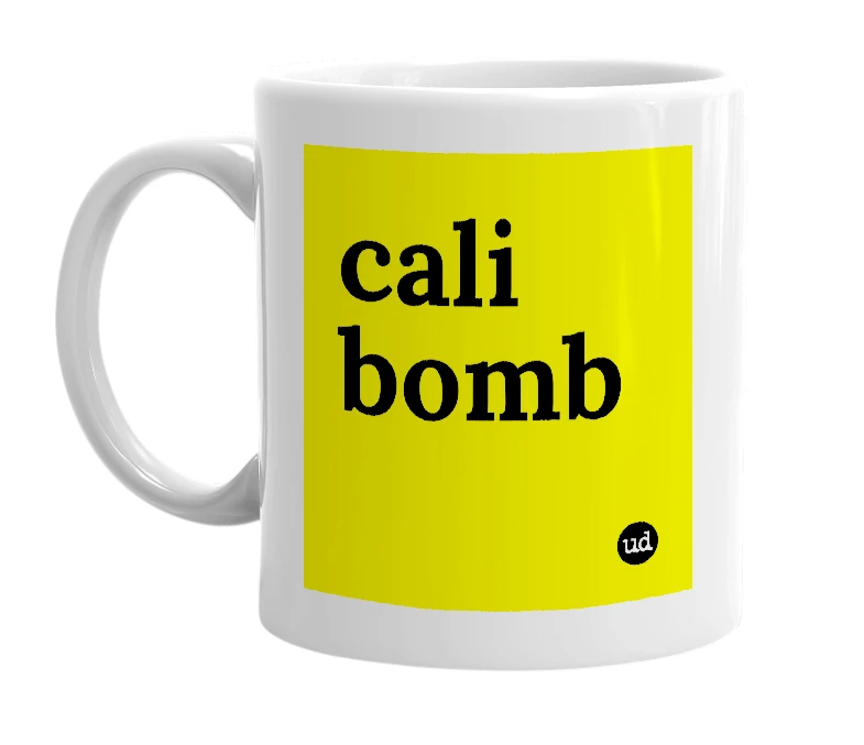 White mug with 'cali bomb' in bold black letters
