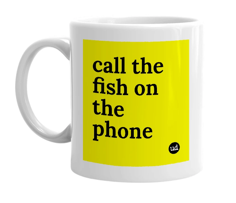 White mug with 'call the fish on the phone' in bold black letters
