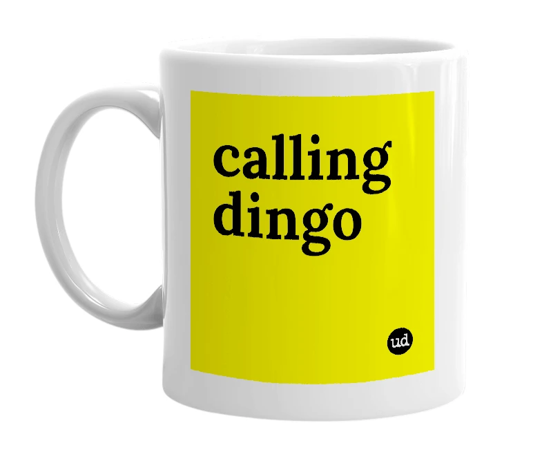 White mug with 'calling dingo' in bold black letters