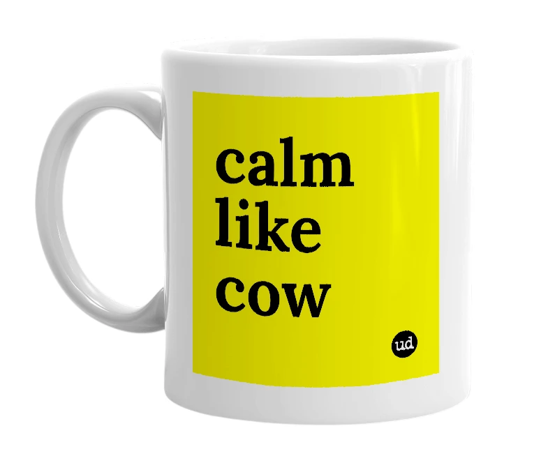 White mug with 'calm like cow' in bold black letters