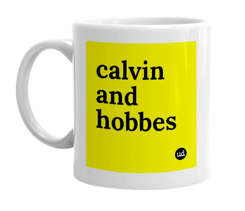 White mug with 'calvin and hobbes' in bold black letters