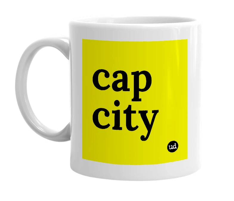 White mug with 'cap city' in bold black letters