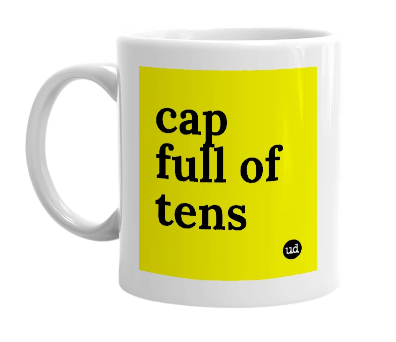 White mug with 'cap full of tens' in bold black letters