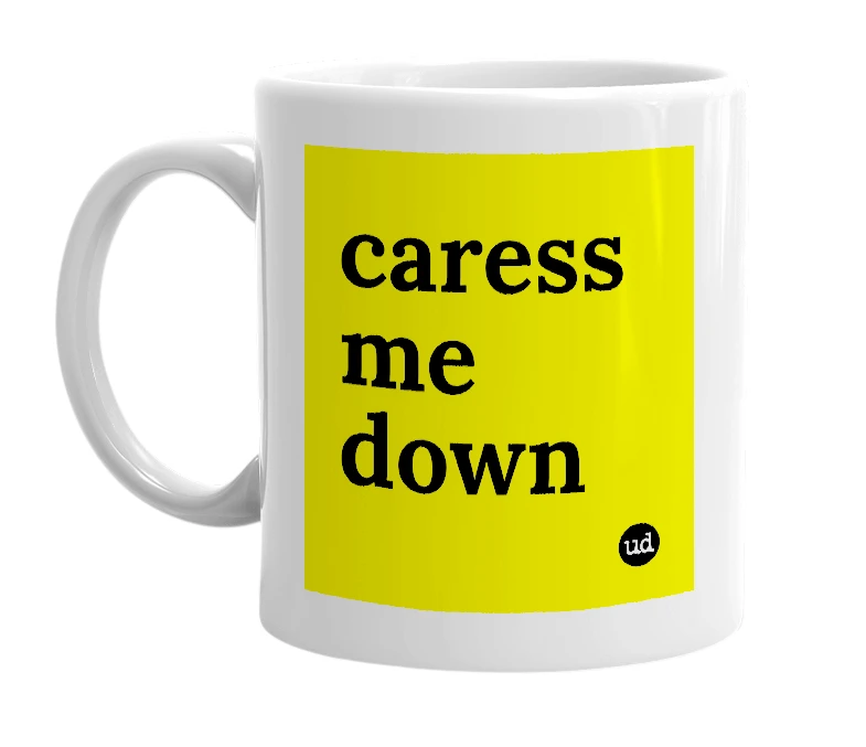 White mug with 'caress me down' in bold black letters