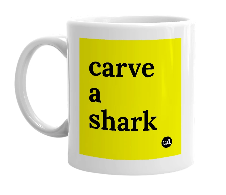 White mug with 'carve a shark' in bold black letters