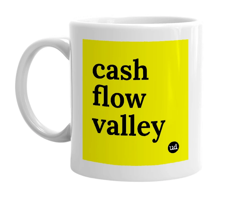 White mug with 'cash flow valley' in bold black letters
