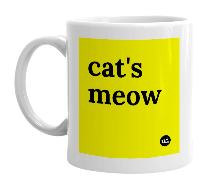 White mug with 'cat's meow' in bold black letters