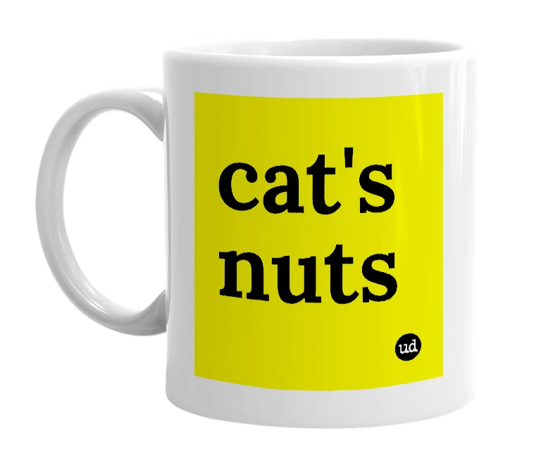 White mug with 'cat's nuts' in bold black letters