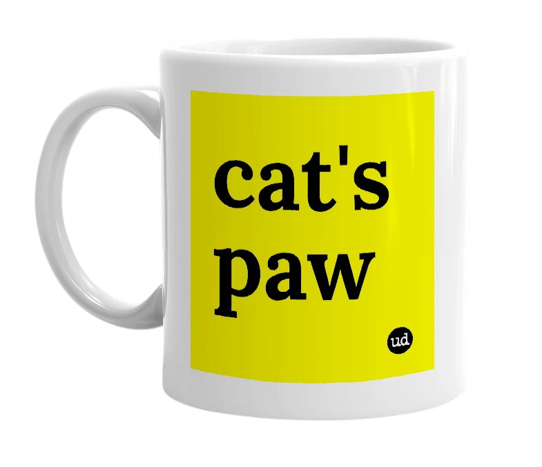 White mug with 'cat's paw' in bold black letters