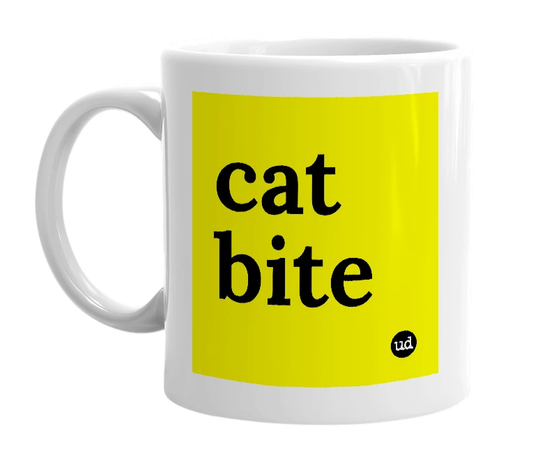 White mug with 'cat bite' in bold black letters