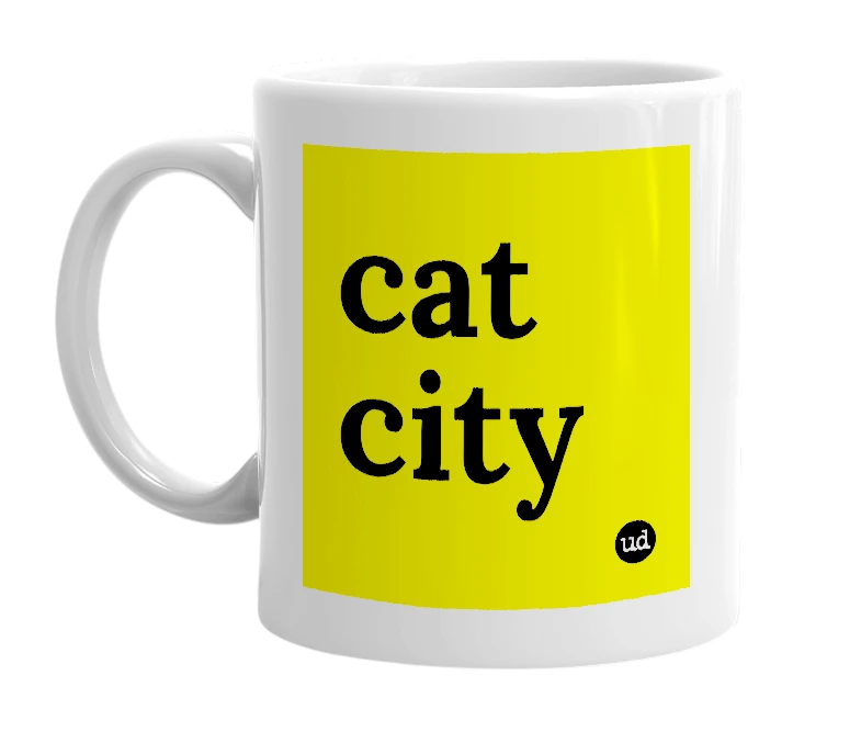 White mug with 'cat city' in bold black letters