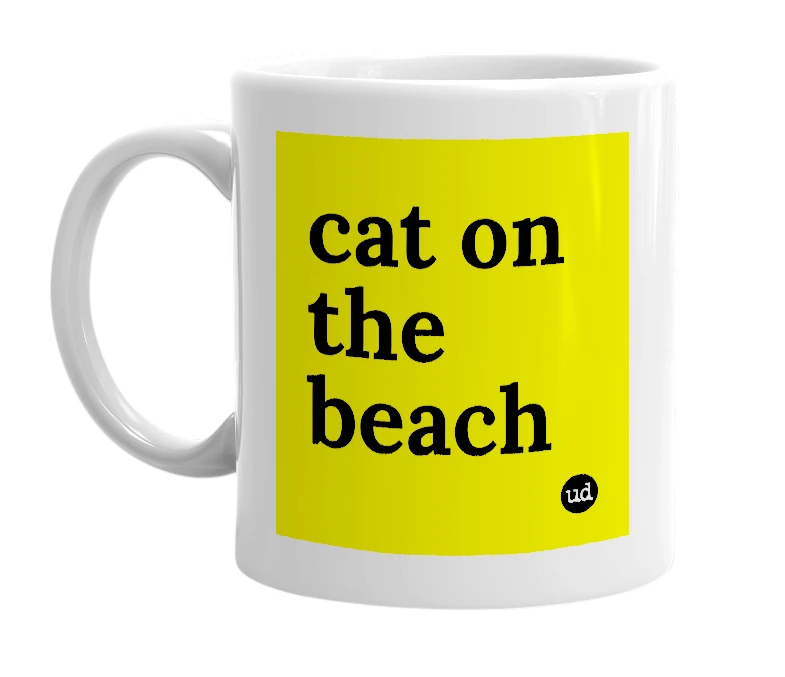 White mug with 'cat on the beach' in bold black letters