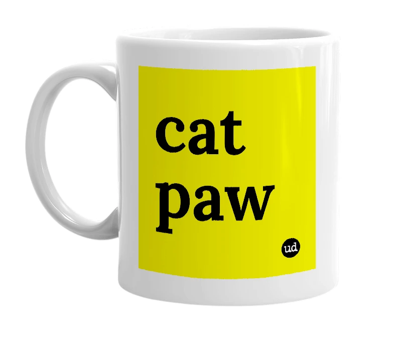 White mug with 'cat paw' in bold black letters