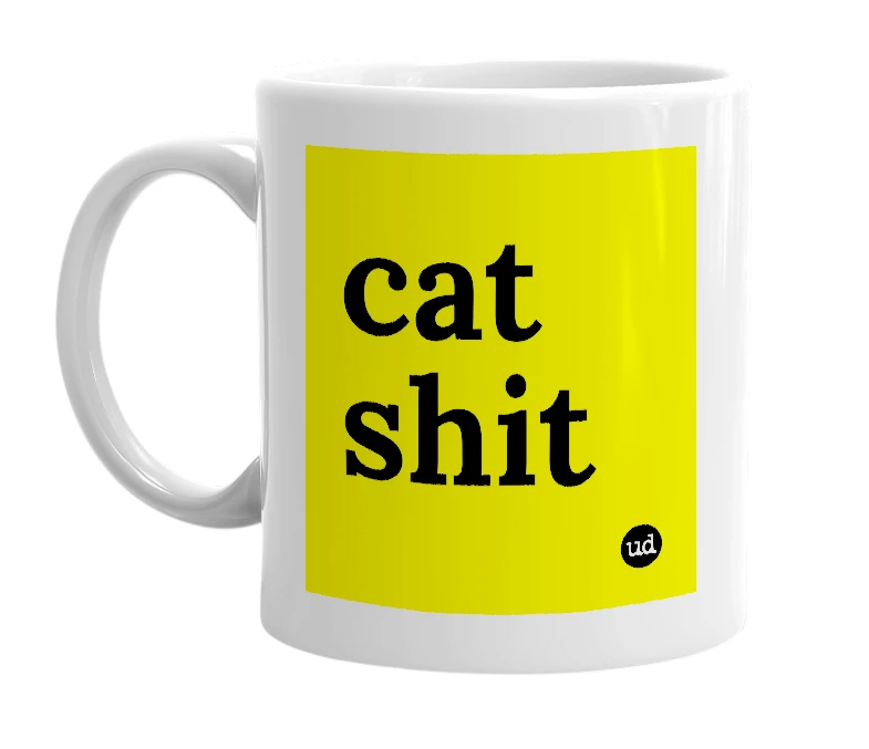 White mug with 'cat shit' in bold black letters