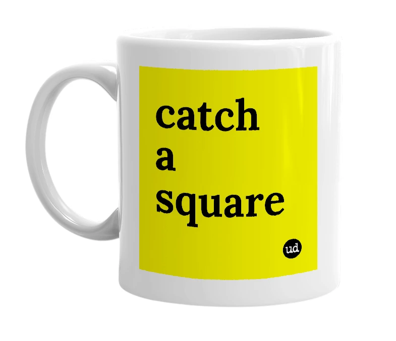 White mug with 'catch a square' in bold black letters