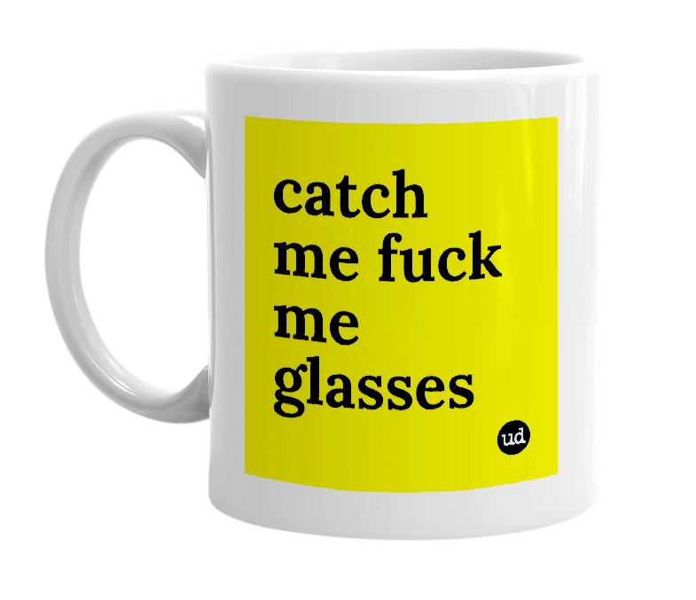 White mug with 'catch me fuck me glasses' in bold black letters