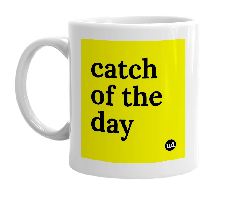 White mug with 'catch of the day' in bold black letters