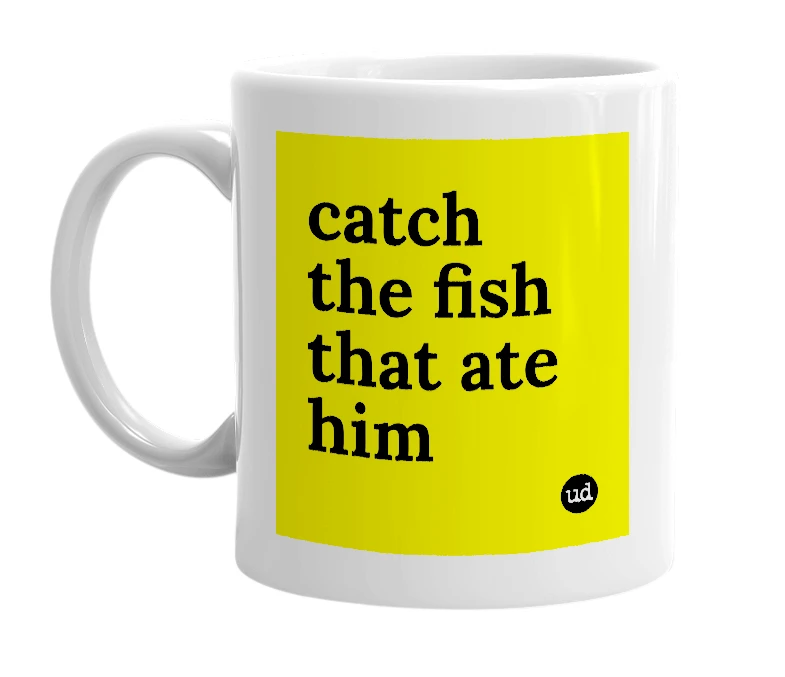 White mug with 'catch the fish that ate him' in bold black letters