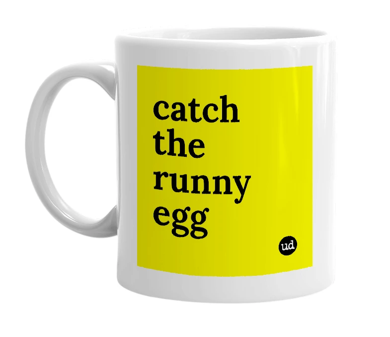 White mug with 'catch the runny egg' in bold black letters