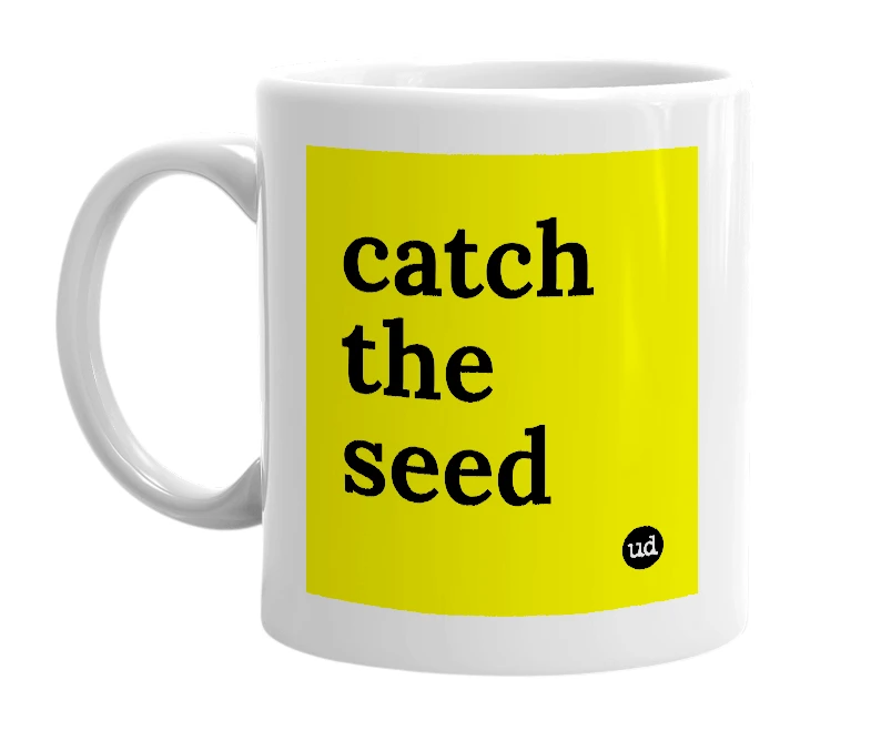 White mug with 'catch the seed' in bold black letters