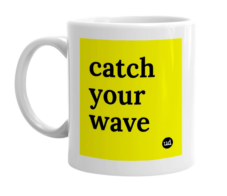 White mug with 'catch your wave' in bold black letters