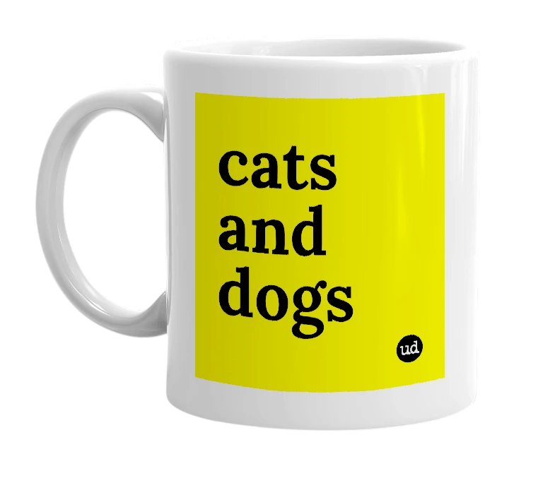 White mug with 'cats and dogs' in bold black letters