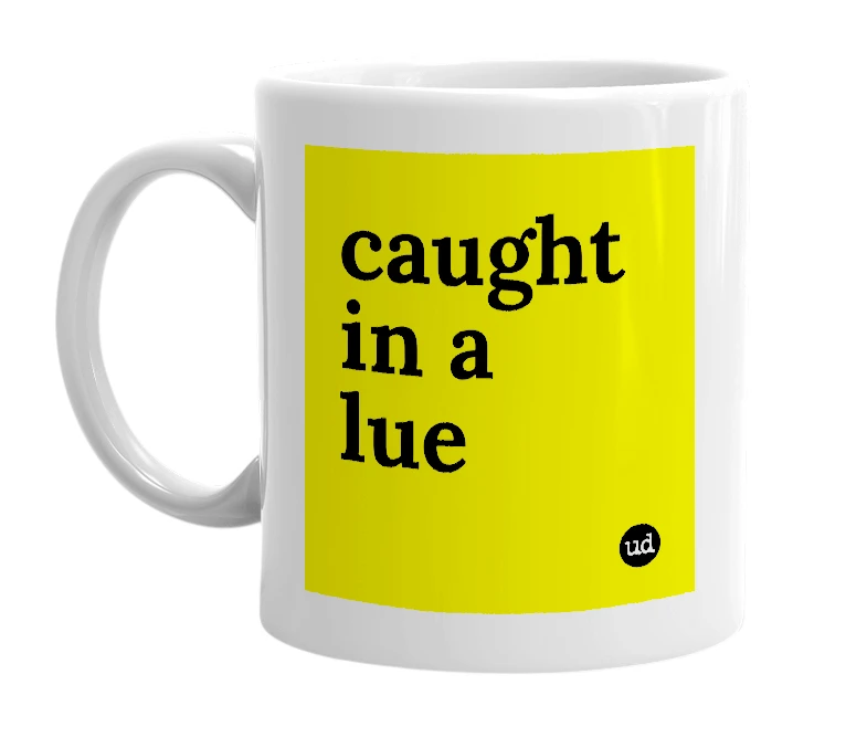 White mug with 'caught in a lue' in bold black letters