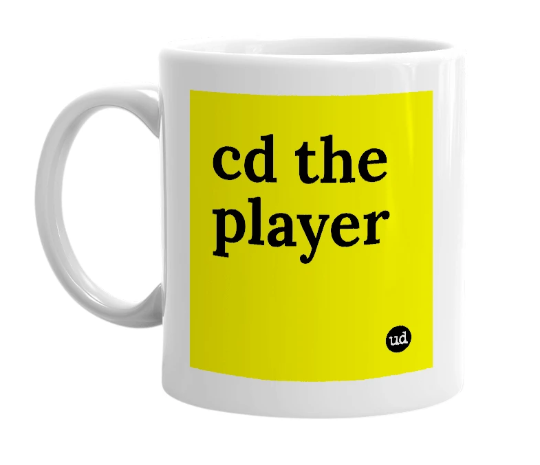 White mug with 'cd the player' in bold black letters