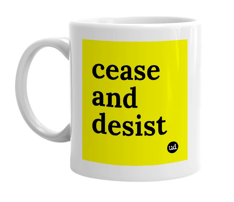 White mug with 'cease and desist' in bold black letters