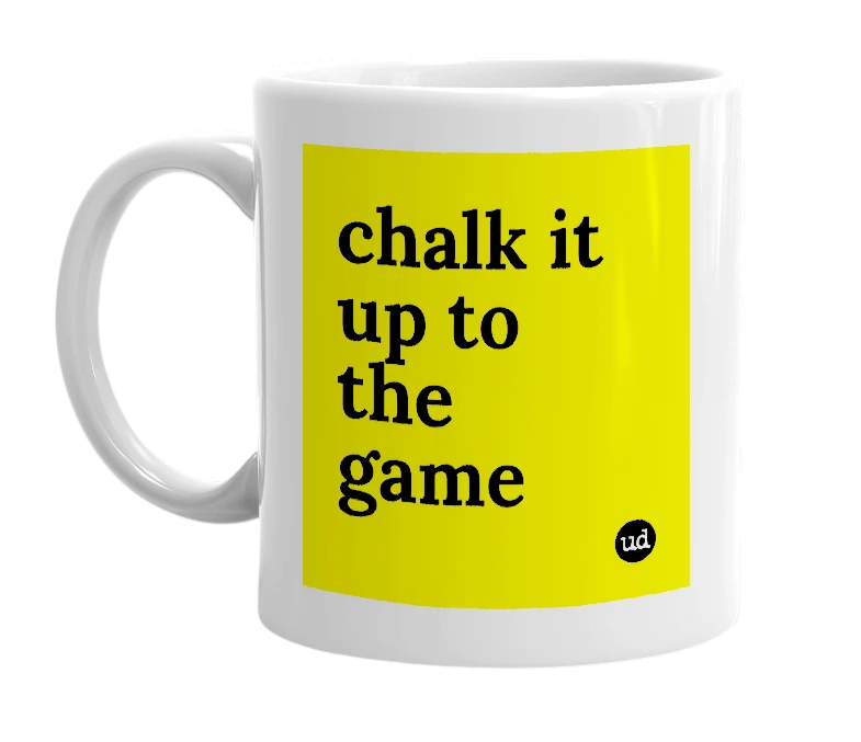 White mug with 'chalk it up to the game' in bold black letters