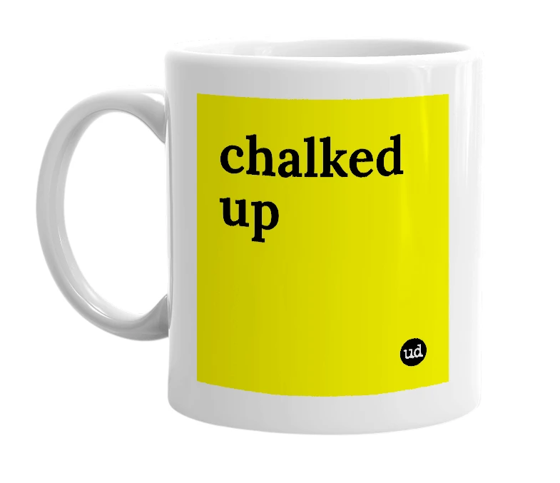 White mug with 'chalked up' in bold black letters