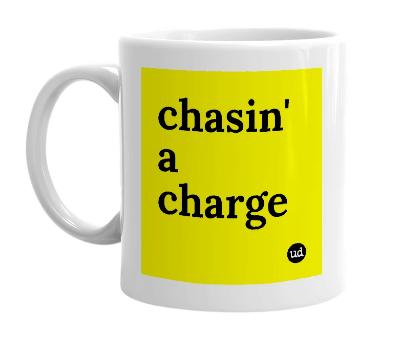 White mug with 'chasin' a charge' in bold black letters