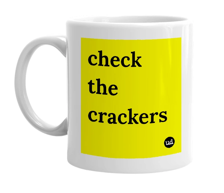 White mug with 'check the crackers' in bold black letters