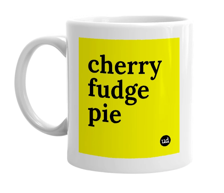 White mug with 'cherry fudge pie' in bold black letters