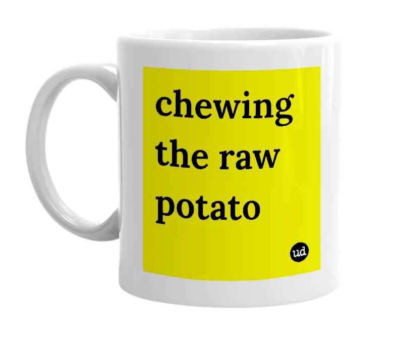 White mug with 'chewing the raw potato' in bold black letters