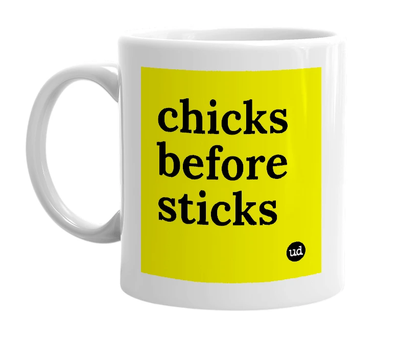 White mug with 'chicks before sticks' in bold black letters