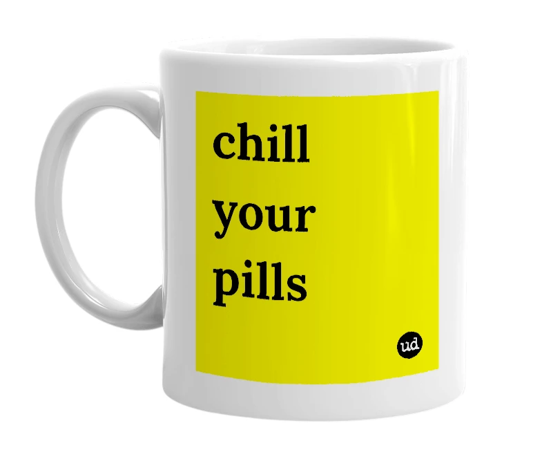 White mug with 'chill your pills' in bold black letters