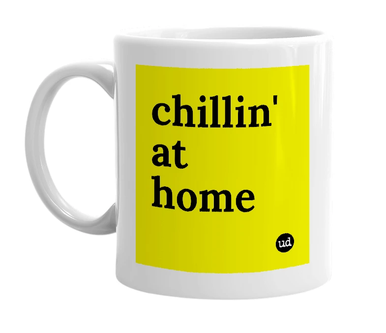 White mug with 'chillin' at home' in bold black letters