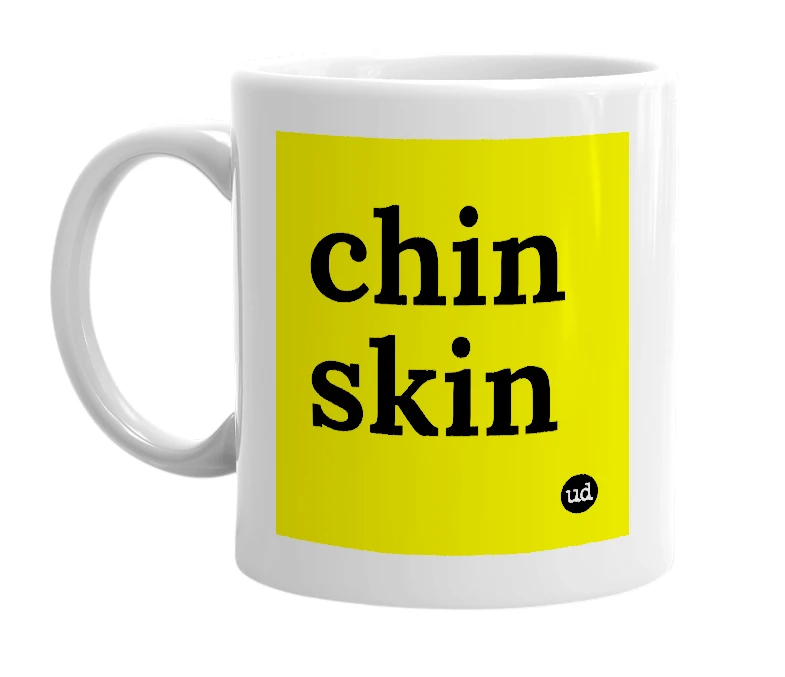 White mug with 'chin skin' in bold black letters