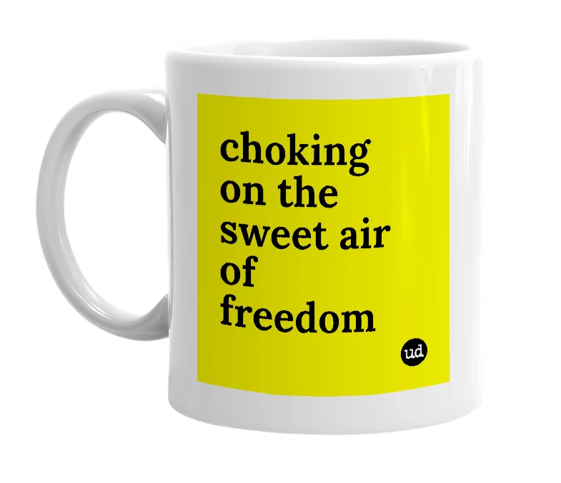 White mug with 'choking on the sweet air of freedom' in bold black letters