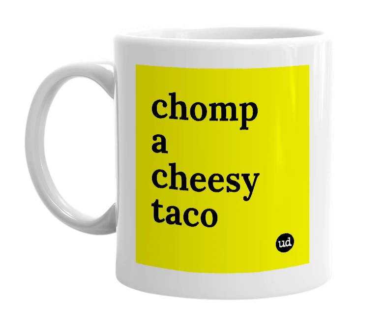 White mug with 'chomp a cheesy taco' in bold black letters