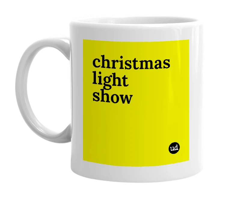 White mug with 'christmas light show' in bold black letters