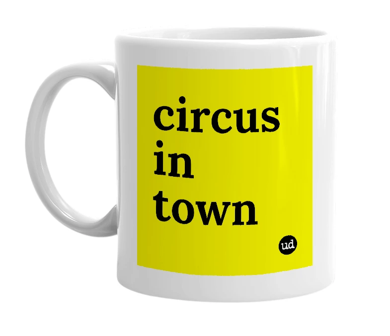 White mug with 'circus in town' in bold black letters