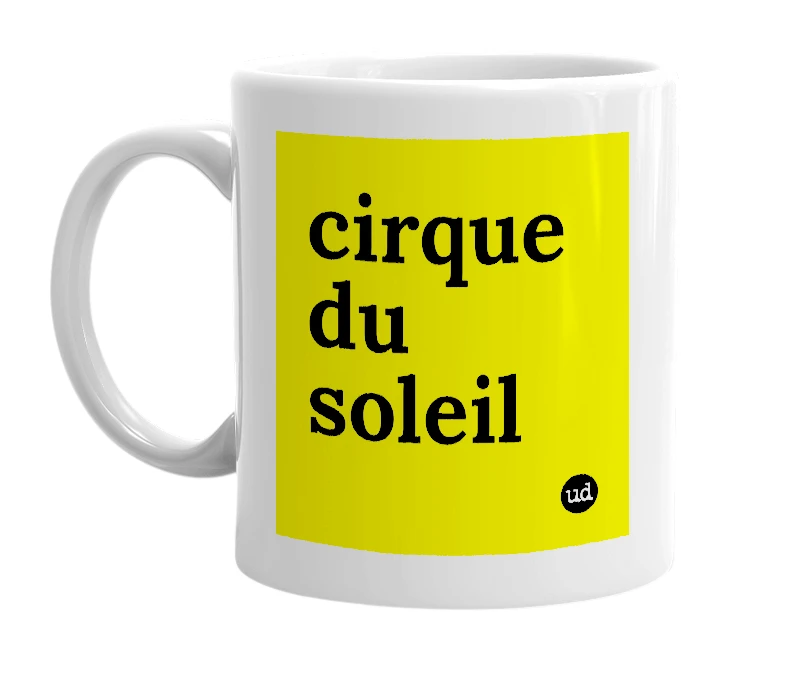 White mug with 'cirque du soleil' in bold black letters