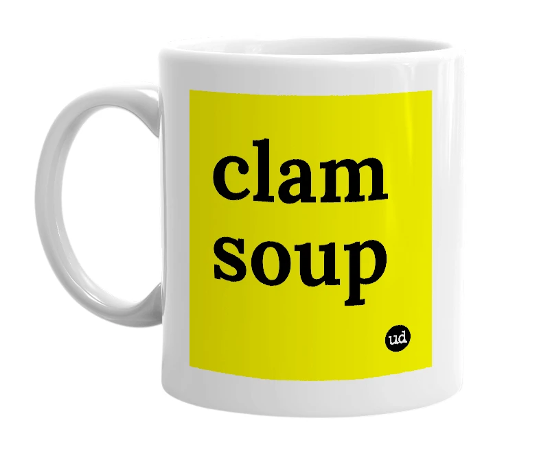 White mug with 'clam soup' in bold black letters