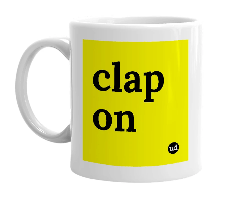 White mug with 'clap on' in bold black letters